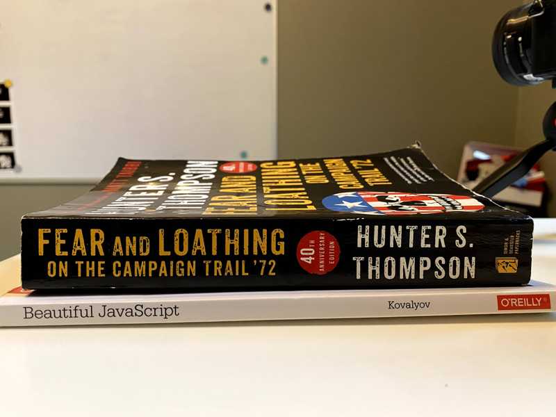 two books: Fear and Loathing on the Campaign Trail '72 by Hunter S. Thompson and Beautiful JavaScript by Kovalyov